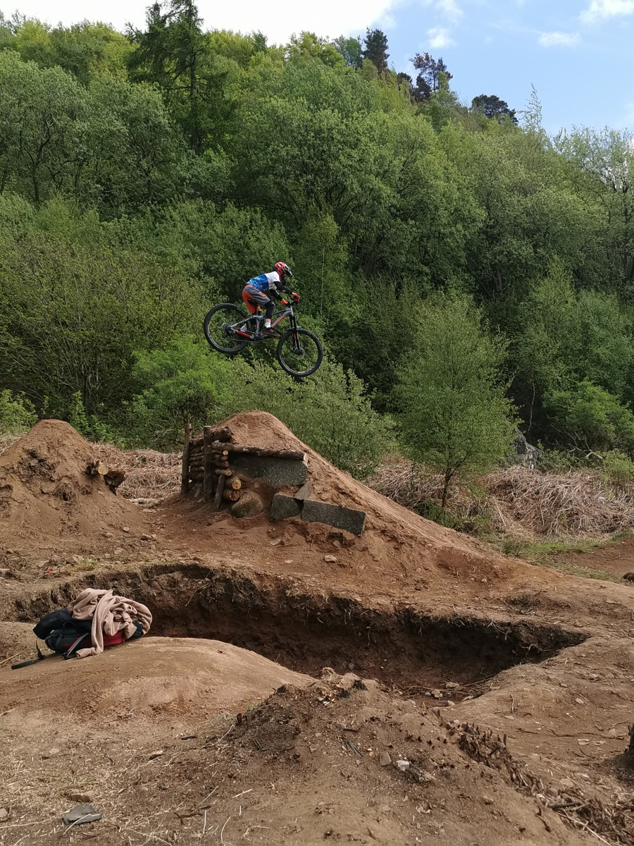 Emily Cook: Snapping her brother aged 12 going over some big jumps